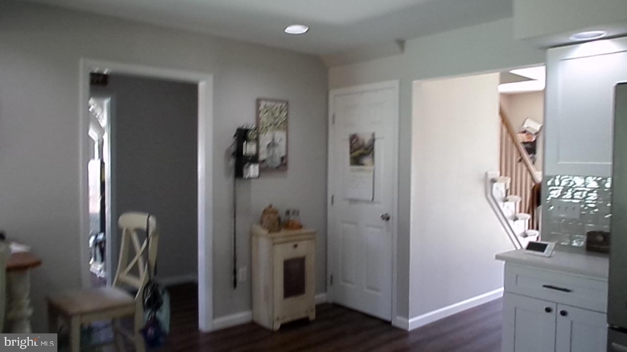 129 Country Lane Sicklerville, NJ 08081 - Photo 50 of 53 a view of a livingroom with wooden floor and a cabinet