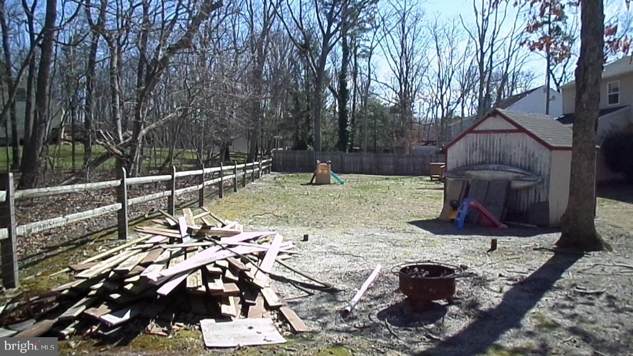129 Country Lane Sicklerville, NJ 08081 - Photo 52 of 53 a view of a backyard with sitting area