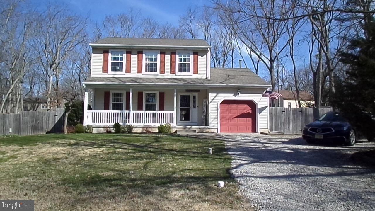 129 Country Lane Sicklerville, NJ 08081 - Photo 53 of 53 a front view of a house with a yard