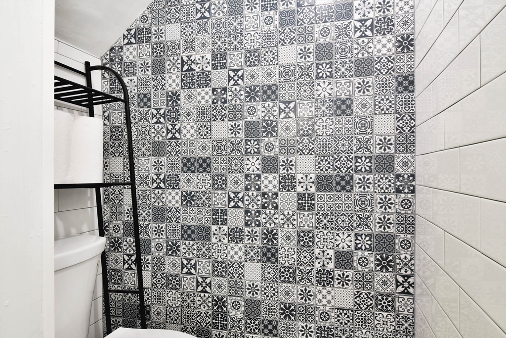 15 Balcomb Street Salem, MA 01970 - Photo 12 of 42 a bathroom with a shower