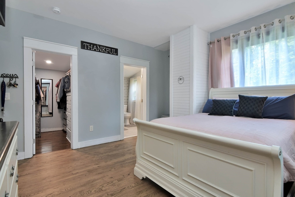 15 Balcomb Street Salem, MA 01970 - Photo 14 of 42 a bedroom with a bed and a window