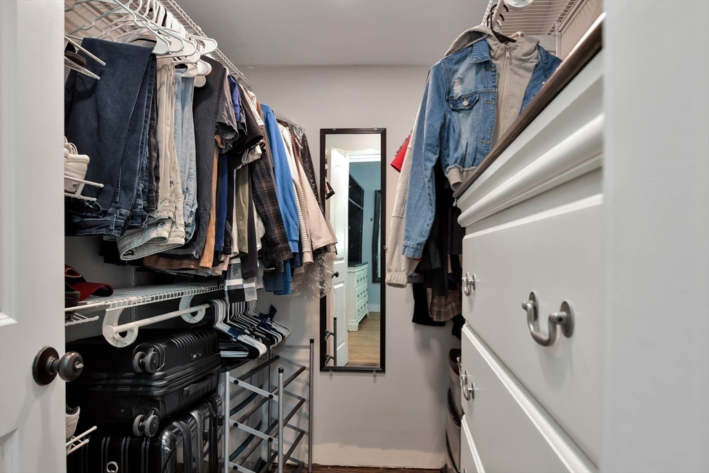 15 Balcomb Street Salem, MA 01970 - Photo 16 of 42 a view of walk in closet with clothes and shoes