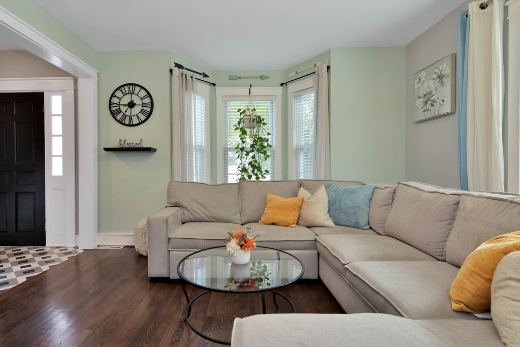 15 Balcomb Street Salem, MA 01970 - Photo 2 of 42 a living room with furniture and a large window