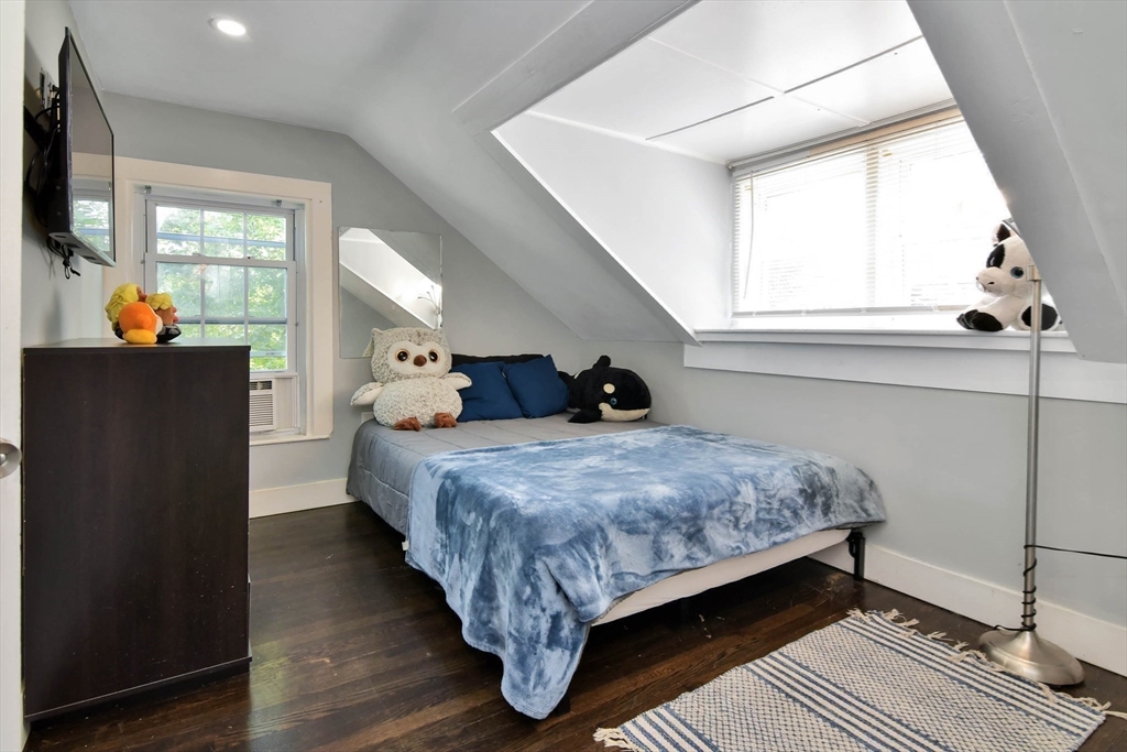 15 Balcomb Street Salem, MA 01970 - Photo 24 of 42 a bedroom with bed and window