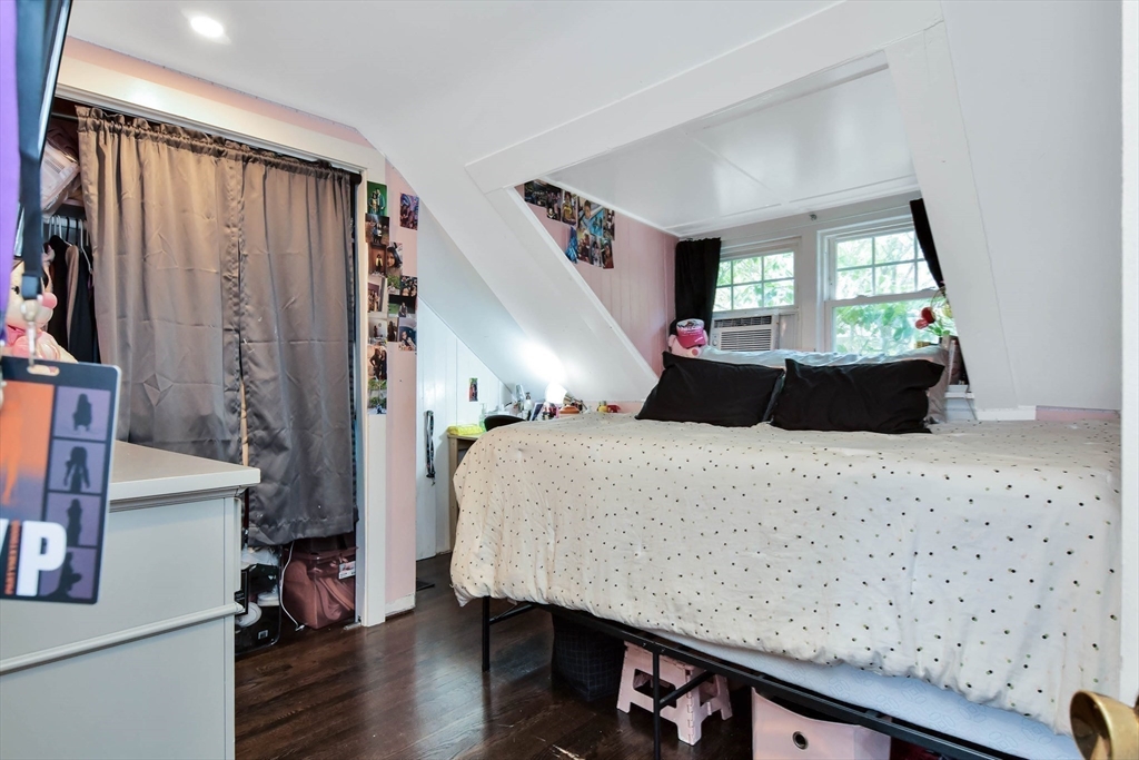 15 Balcomb Street Salem, MA 01970 - Photo 25 of 42 a bed room with a bed chair and a window