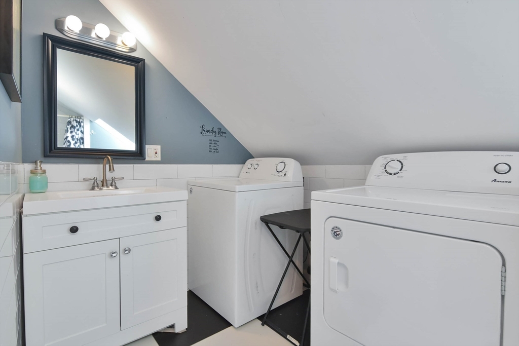 15 Balcomb Street Salem, MA 01970 - Photo 30 of 42 a utility room with dryer and washer