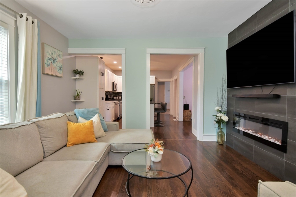 15 Balcomb Street Salem, MA 01970 - Photo 3 of 42 a living room with furniture and a flat screen tv