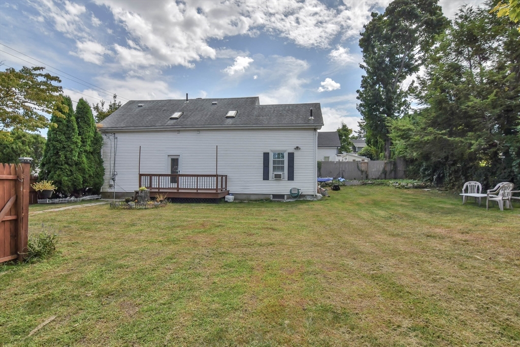 15 Balcomb Street Salem, MA 01970 - Photo 34 of 42 a view of a house with a yard
