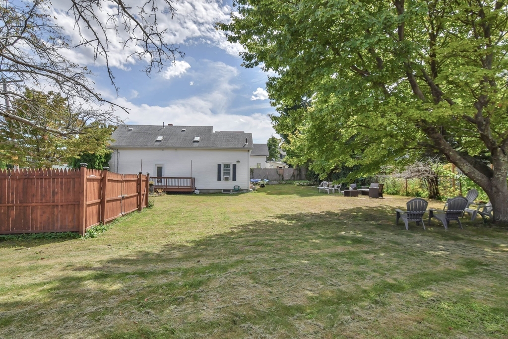 15 Balcomb Street Salem, MA 01970 - Photo 35 of 42 a view of a house with a yard