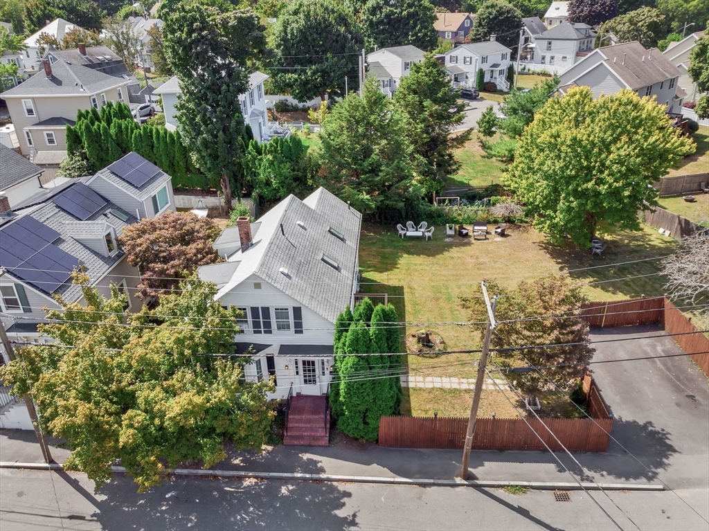 15 Balcomb Street Salem, MA 01970 - Photo 36 of 42 an aerial view of a house with a yard basket ball court and outdoor seating