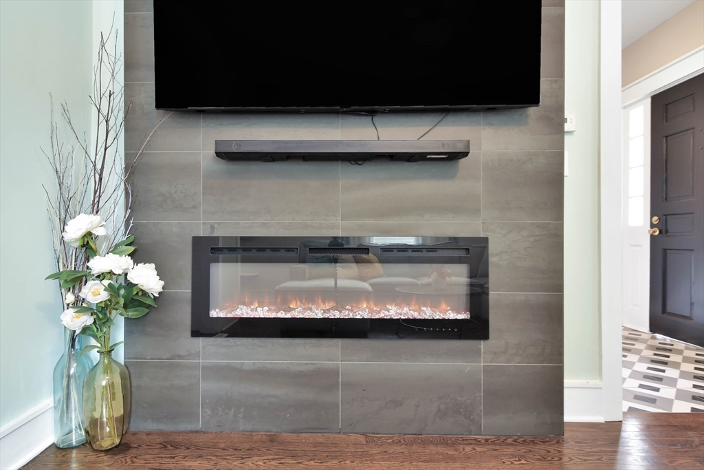 15 Balcomb Street Salem, MA 01970 - Photo 4 of 42 a stove top oven sitting inside of a kitchen