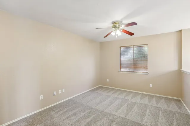 a view of an empty room with window