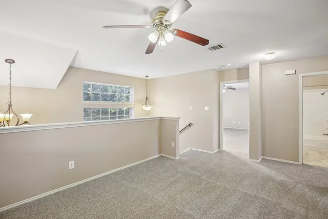 a bathroom with a bathtub shower sink and toilet