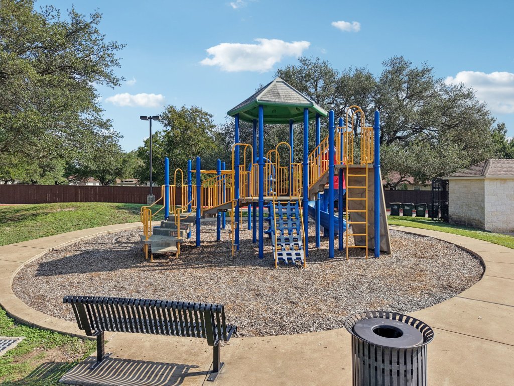 1132 Pine Portage Loop Leander, TX 78641 - Photo 36 of 39 swimming pool view with a seating space and a garden