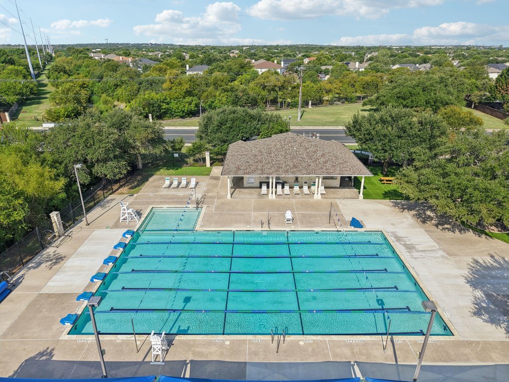 1132 Pine Portage Loop Leander, TX 78641 - Photo 37 of 39 an aerial view of a house with a yard
