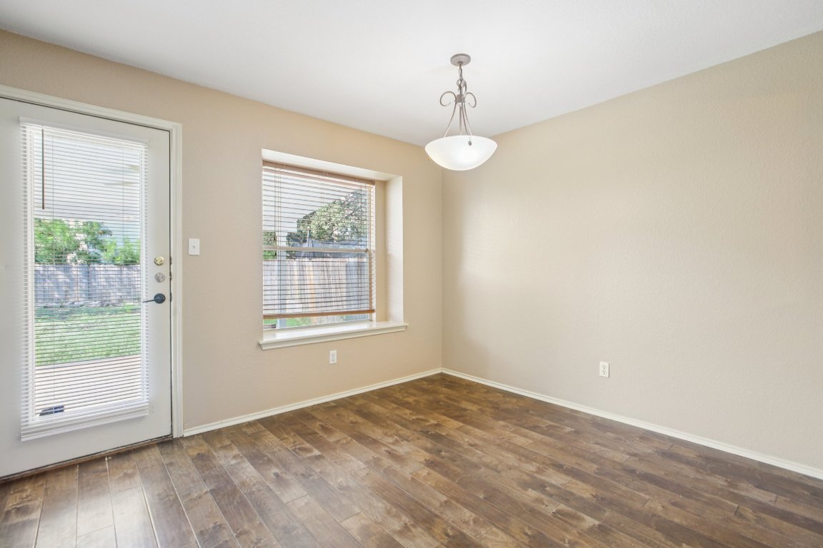 1132 Pine Portage Loop Leander, TX 78641 - Photo 7 of 39 a view of an empty room with a window