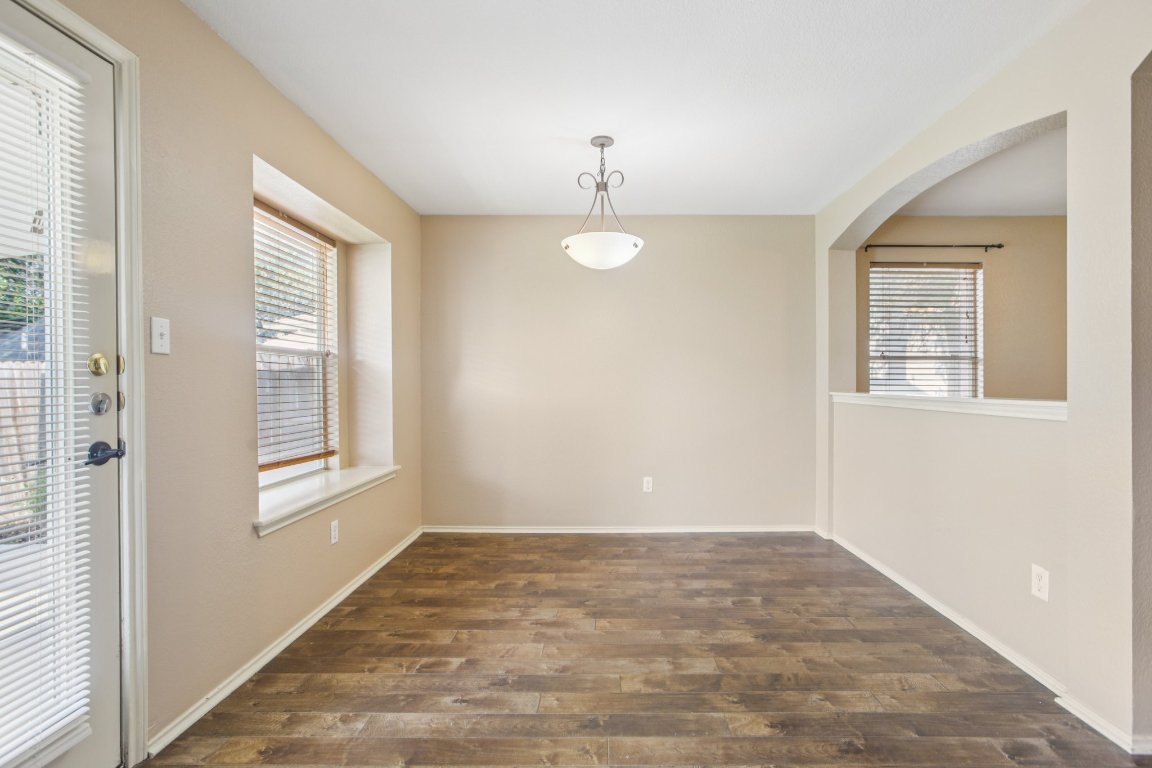 1132 Pine Portage Loop Leander, TX 78641 - Photo 8 of 39 a view of an empty room with a window