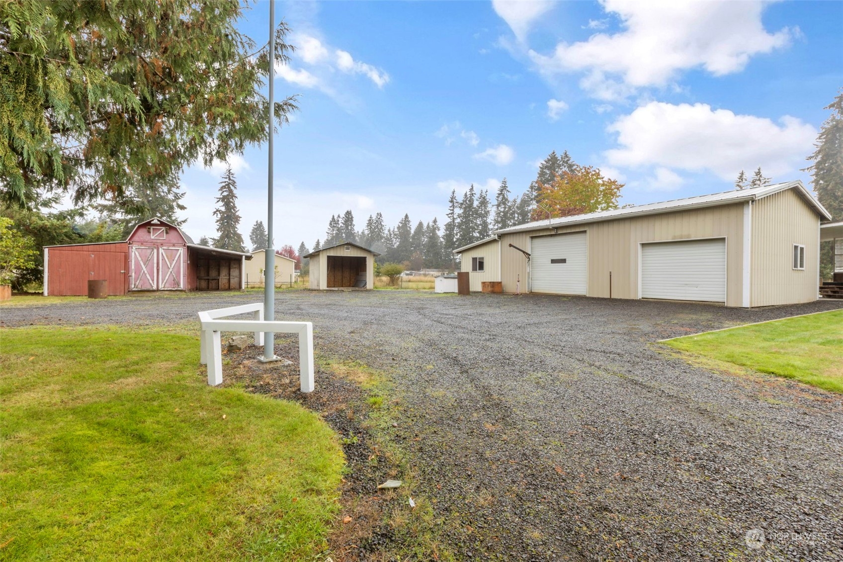 8638 173rd Avenue Southwest Rochester, WA 98579 - Photo 36 of 40 a view of a house with a backyard