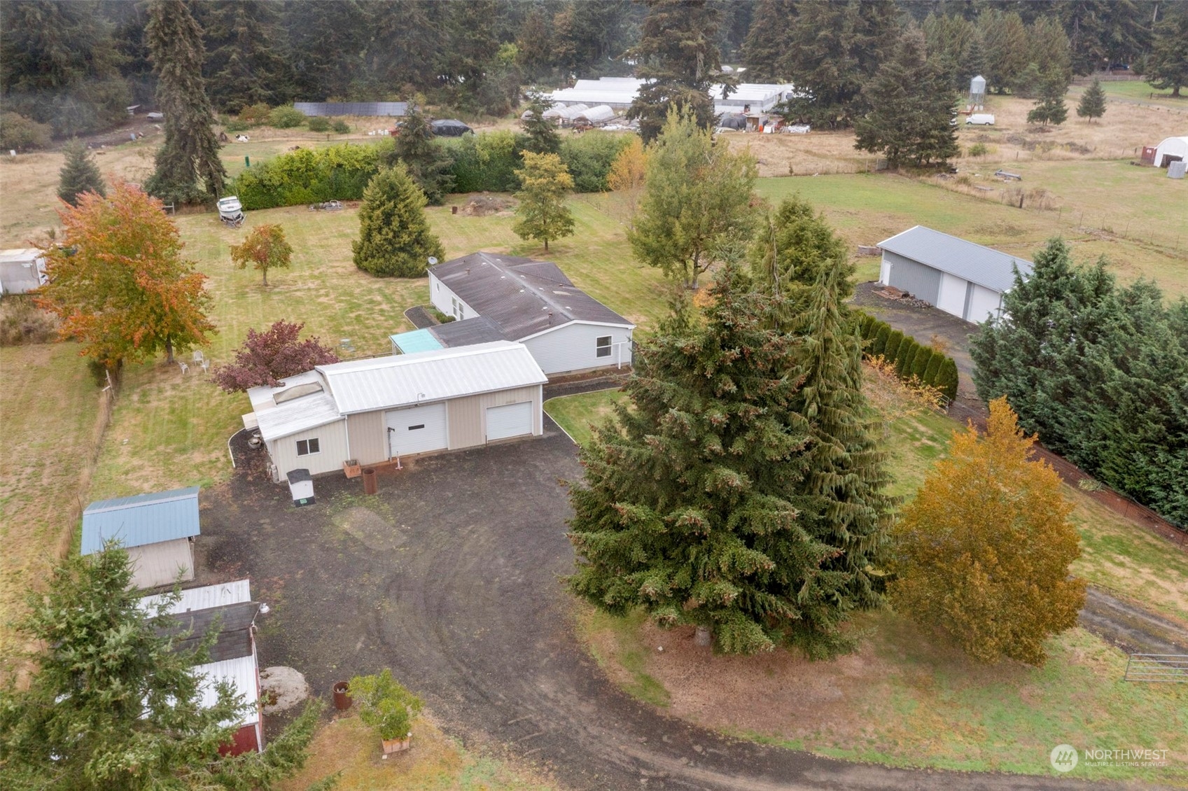 8638 173rd Avenue Southwest Rochester, WA 98579 - Photo 38 of 40 an aerial view of a house with a yard basket ball court and outdoor seating