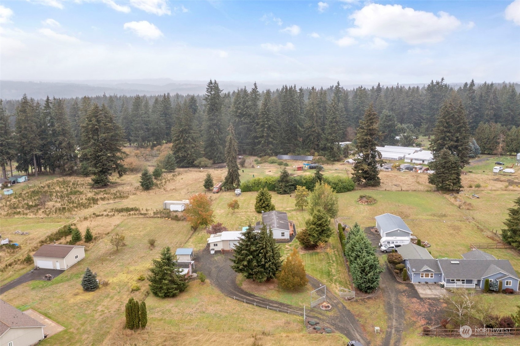 8638 173rd Avenue Southwest Rochester, WA 98579 - Photo 40 of 40 a view of a yard with wooden fence