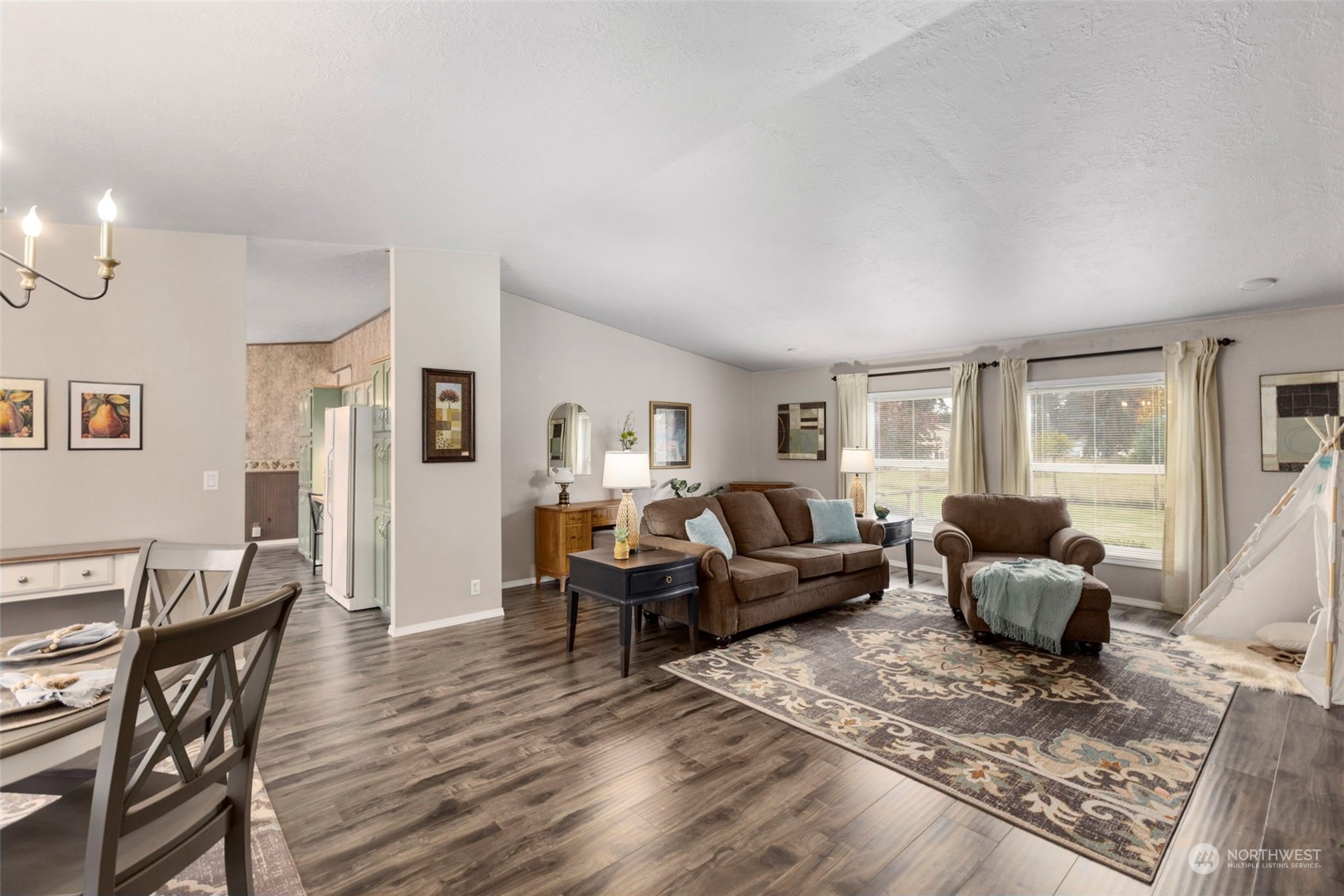 8638 173rd Avenue Southwest Rochester, WA 98579 - Photo 5 of 40 a living room with furniture and wooden floor