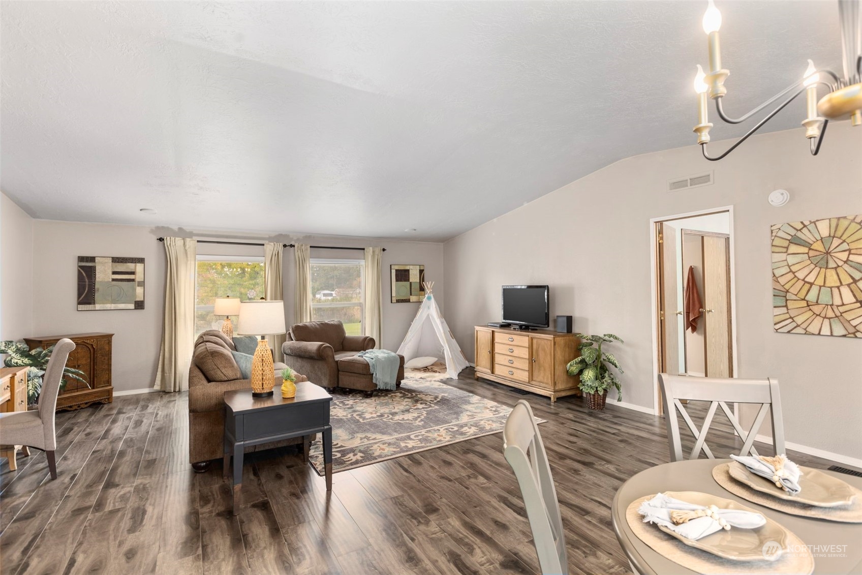 8638 173rd Avenue Southwest Rochester, WA 98579 - Photo 6 of 40 a living room with furniture and wooden floor
