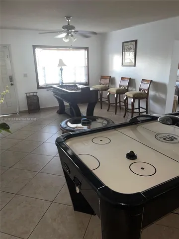 a living room with furniture and window
