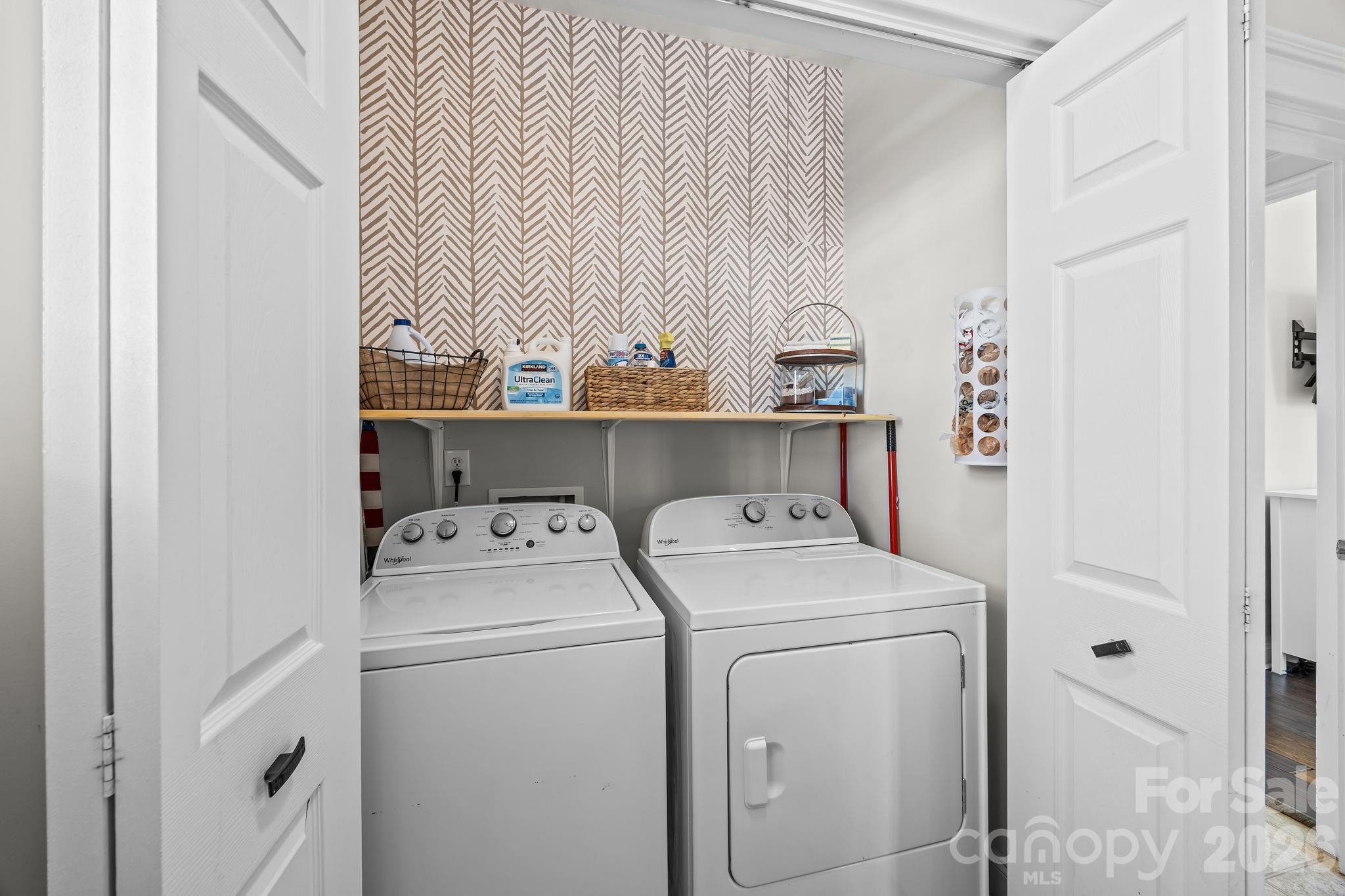 8111 Bud Henderson Road Huntersville, NC 28078 - Photo 19 of 39 a utility room with dryer and washer