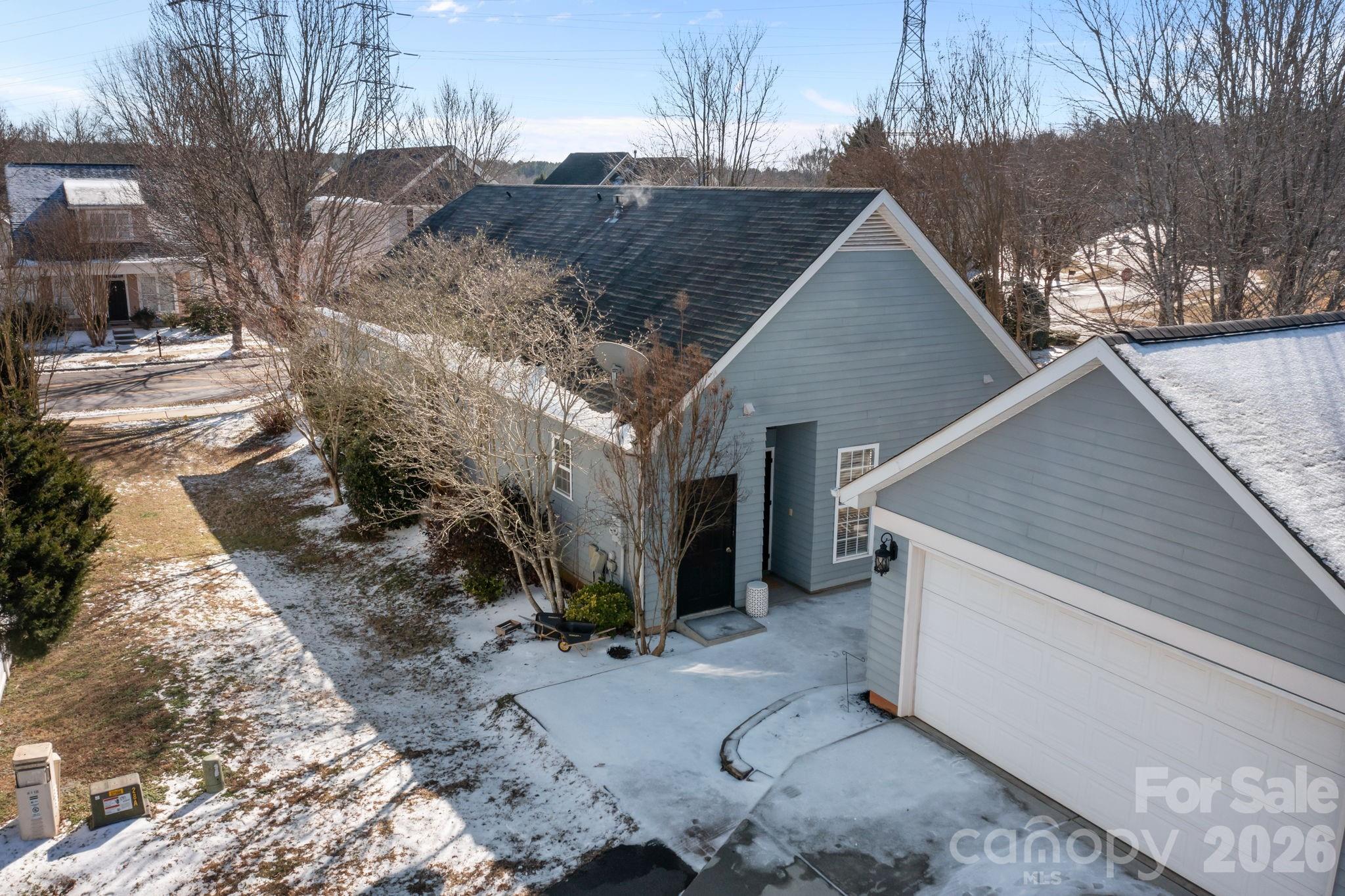 8111 Bud Henderson Road Huntersville, NC 28078 - Photo 27 of 39 a view of a house with a yard