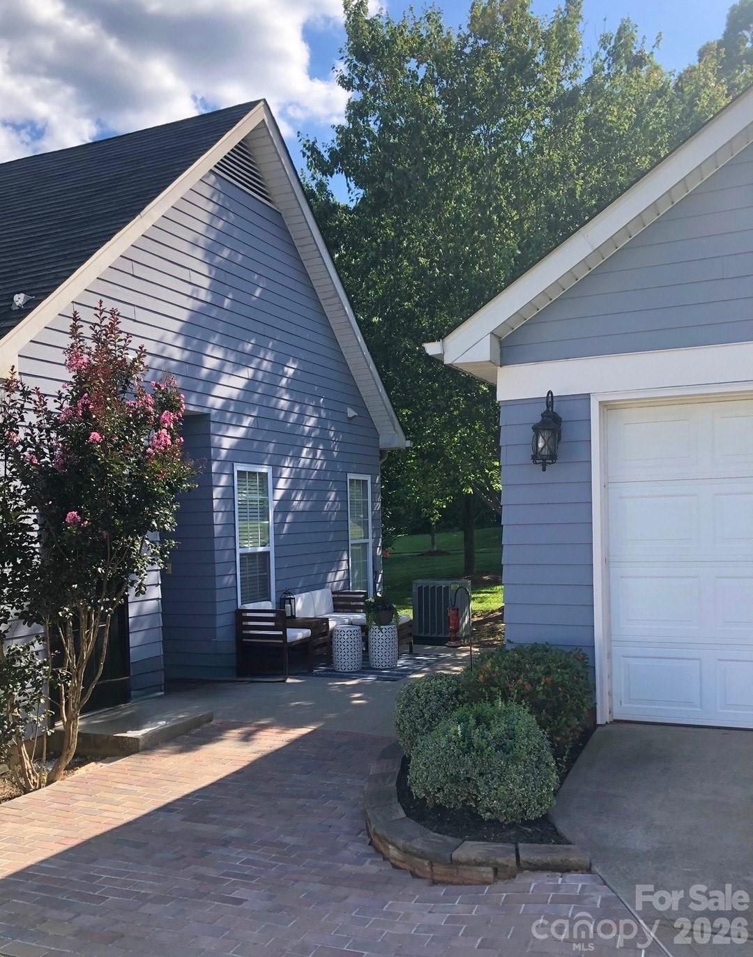 8111 Bud Henderson Road Huntersville, NC 28078 - Photo 29 of 39 a view of a house with a yard