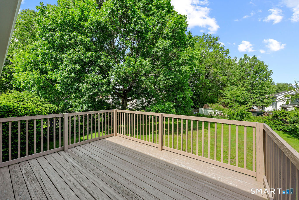 142 Wolcott Hill Road Wethersfield, CT 06109 - Photo 26 of 29 a view of balcony with wooden floor