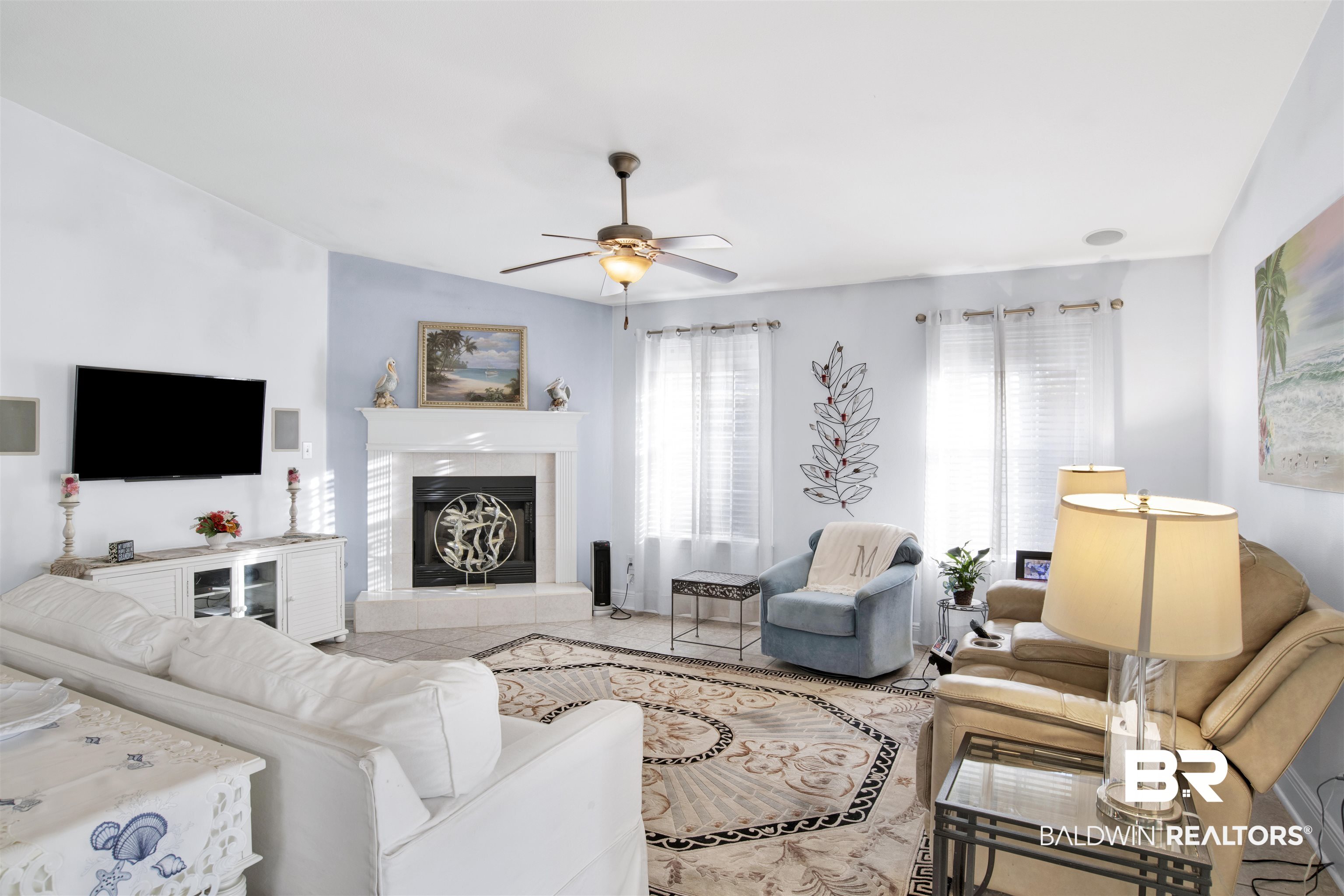 314 Blackfriars Street Fairhope, AL 36532 - Photo 7 of 25 Living room with lofted ceiling, a fireplace, and ceiling fan