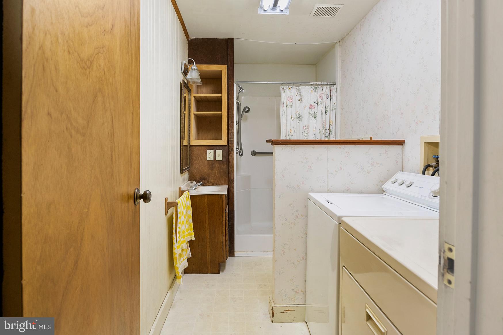 25657 Still Pond Neck Road Worton, MD 21678 - Photo 9 of 36 First Floor Bath and Laundry