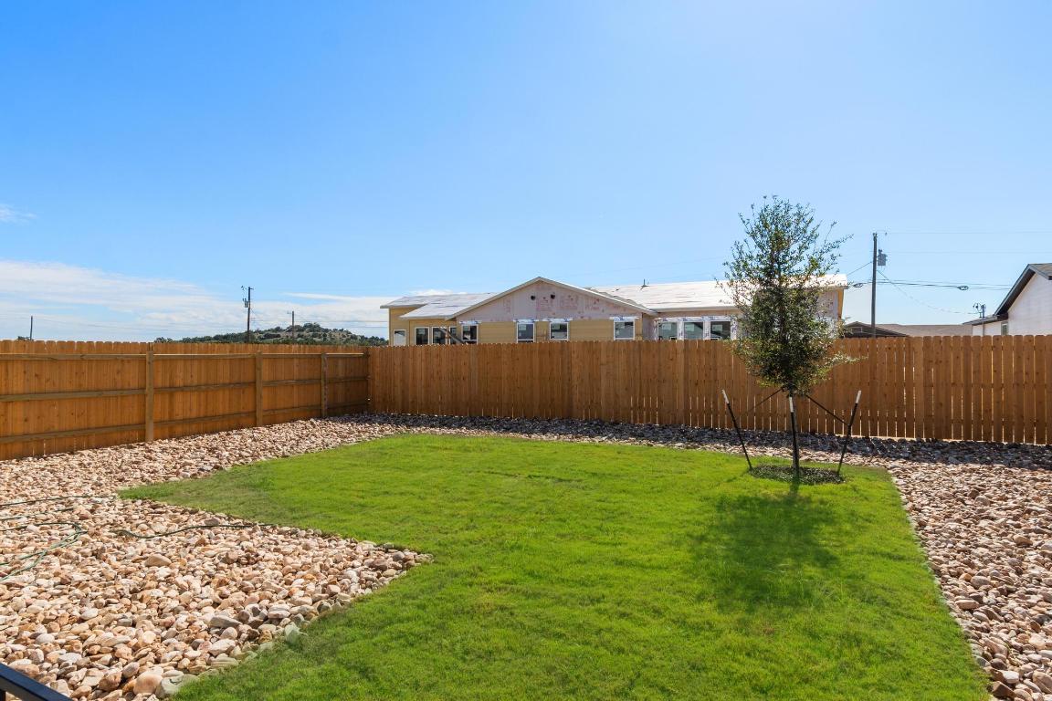 20105 Park Strip Street, Unit A B Lago Vista, TX 78645 - Photo 18 of 26 a view of a backyard