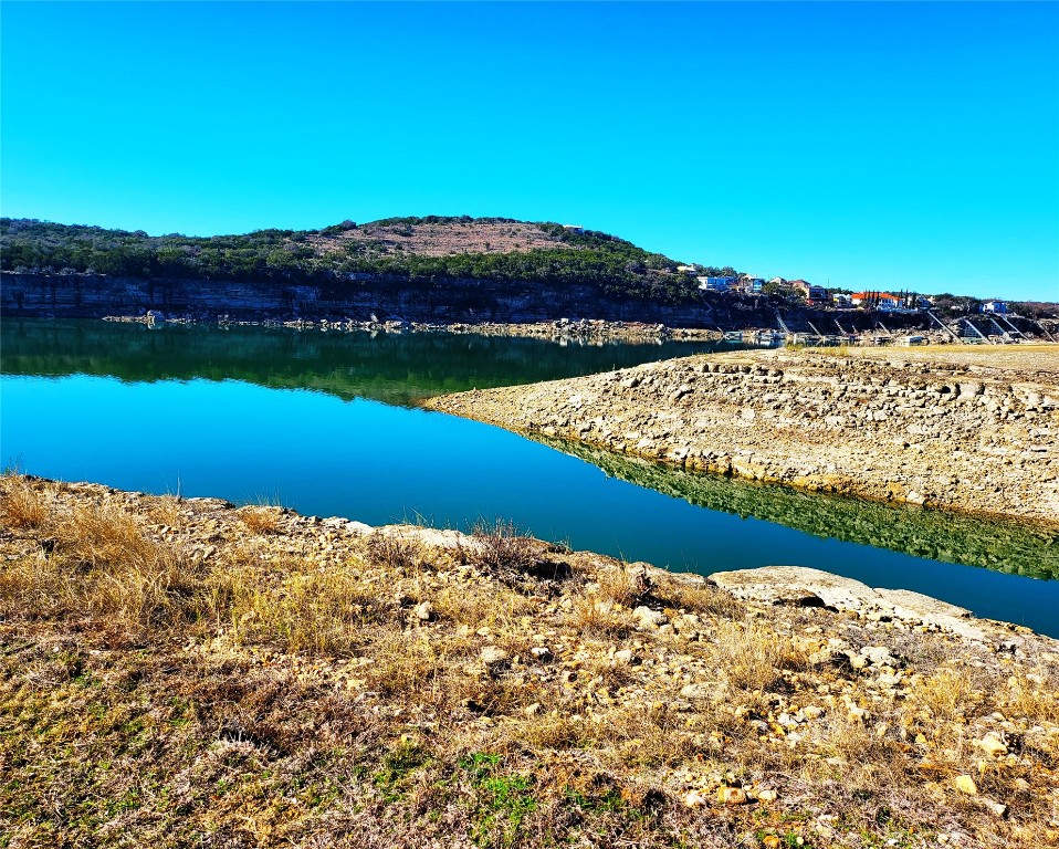 20105 Park Strip Street, Unit A B Lago Vista, TX 78645 - Photo 19 of 26 a view of a field with an ocean