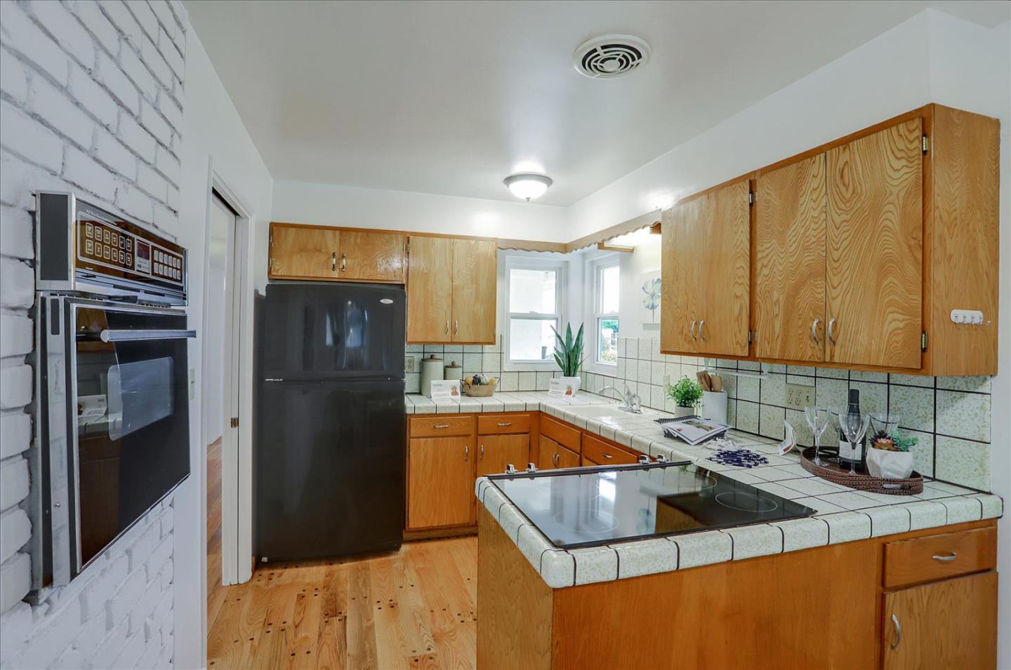 345 Silvera Street Milpitas, CA 95035 - Photo 13 of 38 a kitchen that has a sink cabinets counter space and stainless steel appliances