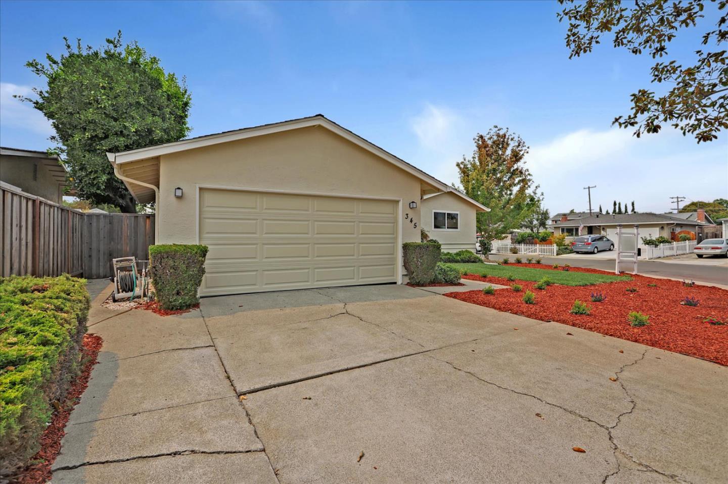 345 Silvera Street Milpitas, CA 95035 - Photo 2 of 38 a view of backyard of house and car parked