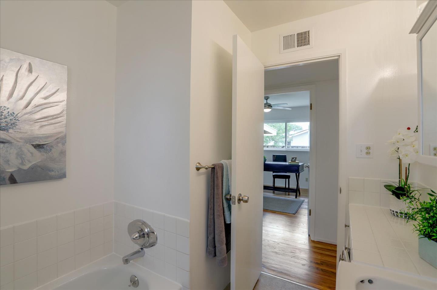 345 Silvera Street Milpitas, CA 95035 - Photo 32 of 38 a bathroom with a bathtub and shower