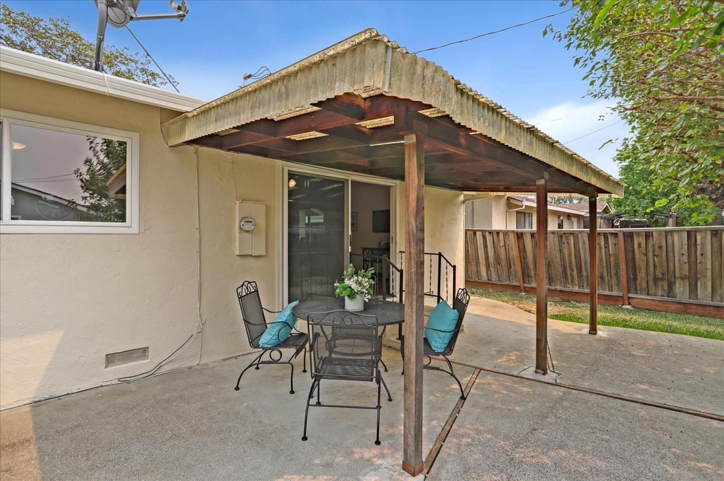 345 Silvera Street Milpitas, CA 95035 - Photo 34 of 38 a view of a chair and table in backyard of the house