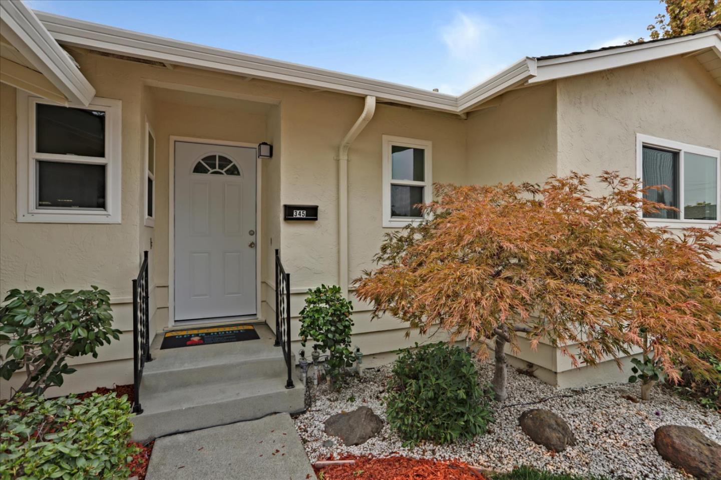 345 Silvera Street Milpitas, CA 95035 - Photo 6 of 38 a front view of a house with garden
