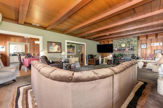 a bathroom with a sink a mirror and a toilet