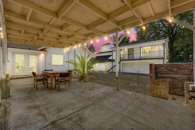 a view of a balcony with wooden floor