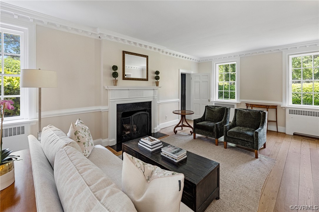 4105 Sulgrave Road Richmond, VA 23221 - Photo 16 of 30 a living room with furniture and a fireplace