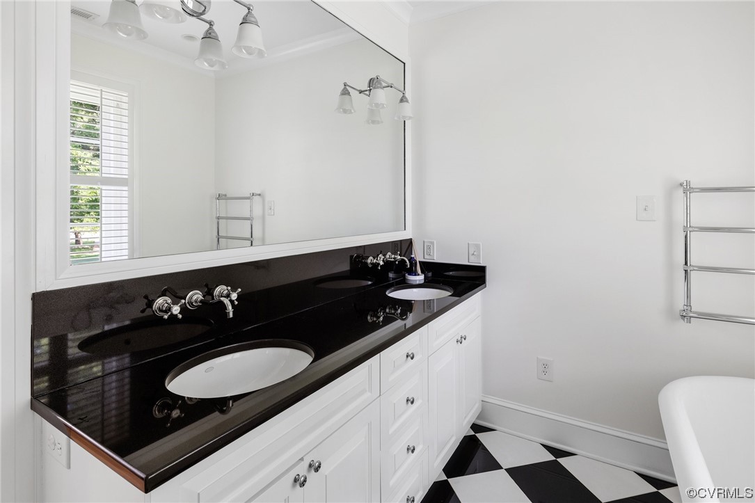 4105 Sulgrave Road Richmond, VA 23221 - Photo 19 of 30 a bathroom with a sink and a mirror