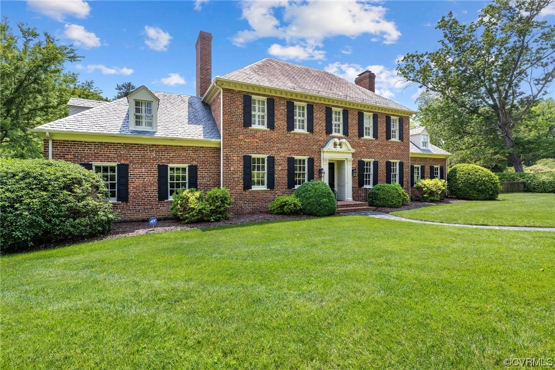 4105 Sulgrave Road Richmond, VA 23221 - Photo 2 of 30 a front view of a house with a garden