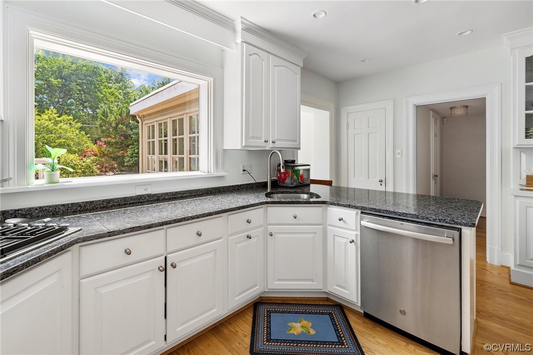 4105 Sulgrave Road Richmond, VA 23221 - Photo 6 of 30 a kitchen with granite countertop white cabinets and white appliances