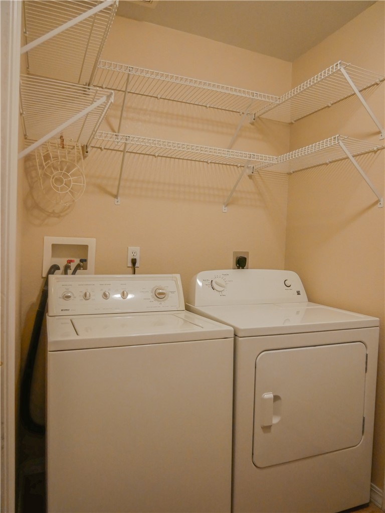 2575 Triangle S Street Kingman, AZ 86401 - Photo 17 of 45 a utility room with dryer and washer