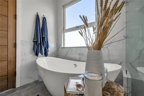 a bathroom with a toilet and a sink