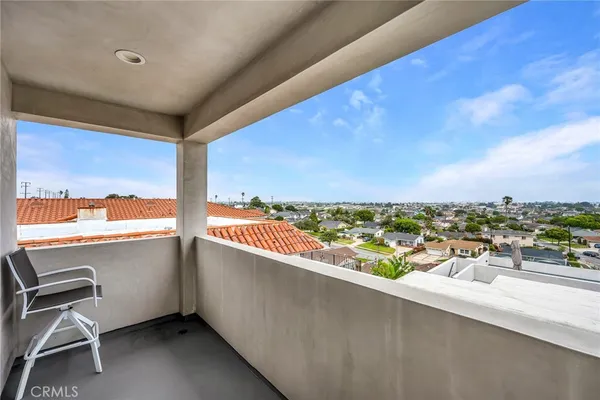 a view of a balcony with city view