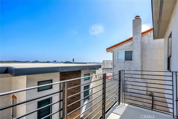 a view of a balcony with an outdoor space